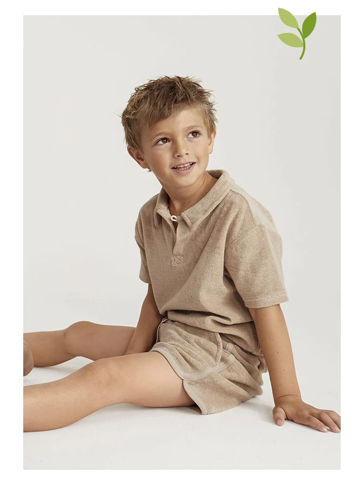 Titelseite -OshKosh Verkäufe hessnatur frottee poloshirt in beige